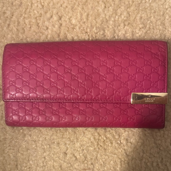 Gucci Handbags - Gucci Hot Pink Embossed GG Leather Continental Wallet with Gold Accent